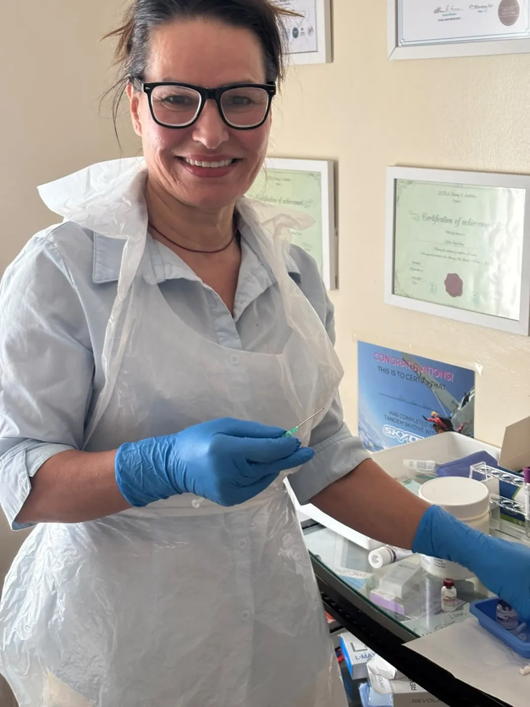 Mel Barge smiling in her private treatment room in Oakham