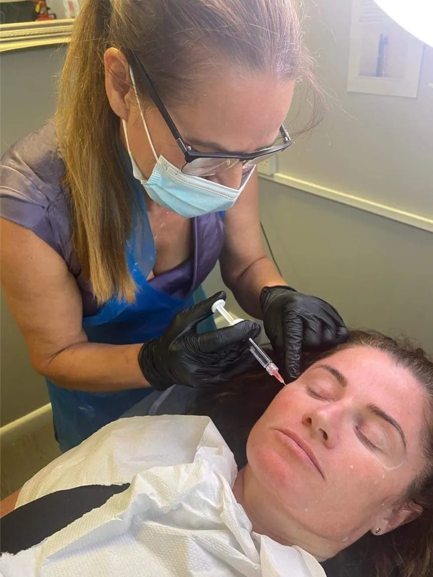Mel Barge treating a client with skin boosters in Oakham
